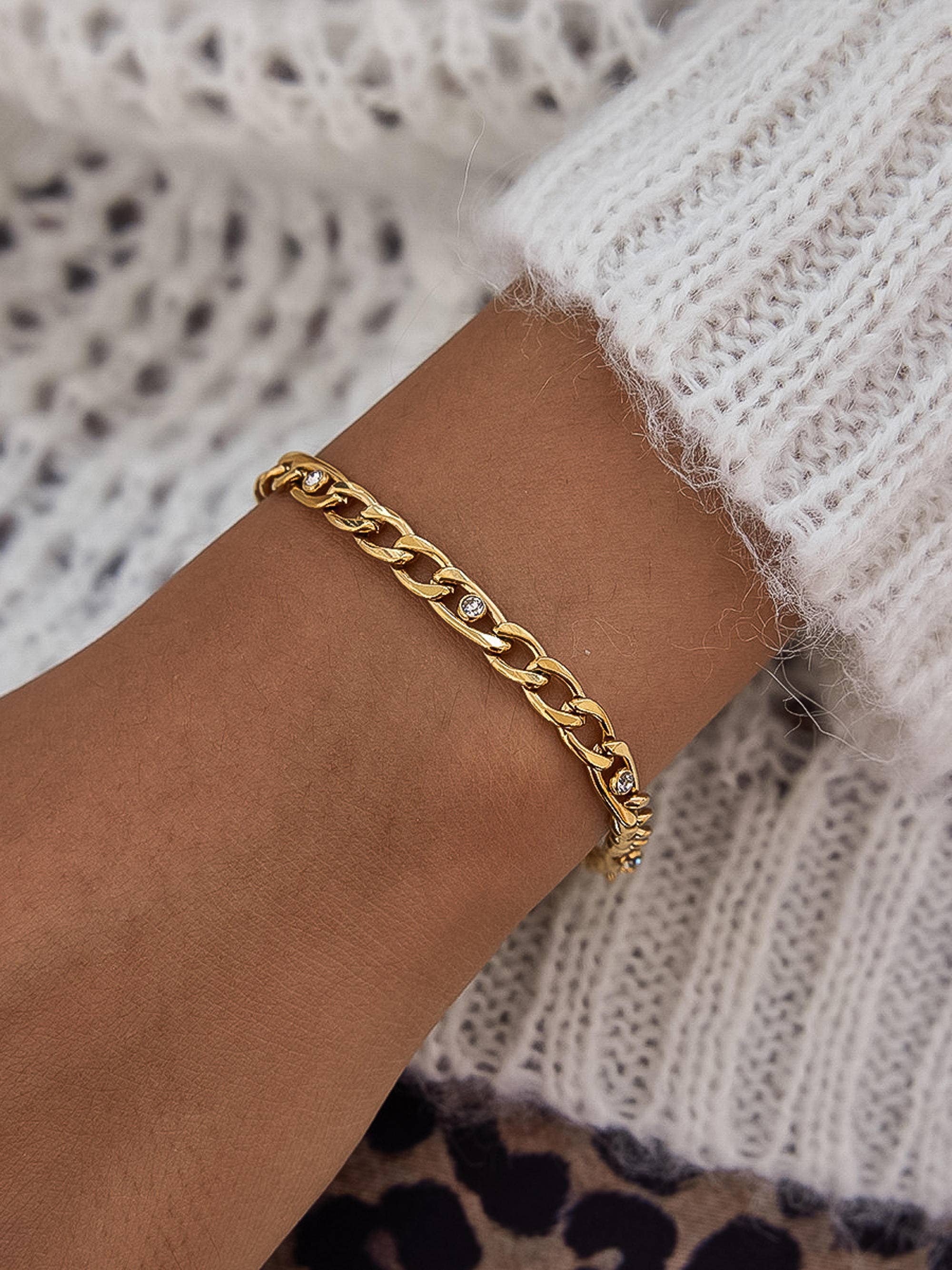 Berlin 18K gold Cuban chain bracelet with CZ accents on wrist, non-tarnish gold jewelry